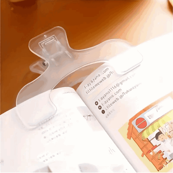 CLIP PARA MANTENER LIBRO ABIERTO - TRANSPARENTE